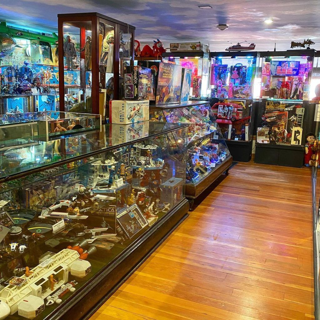 A Large Room With Many Shelves Of Toys